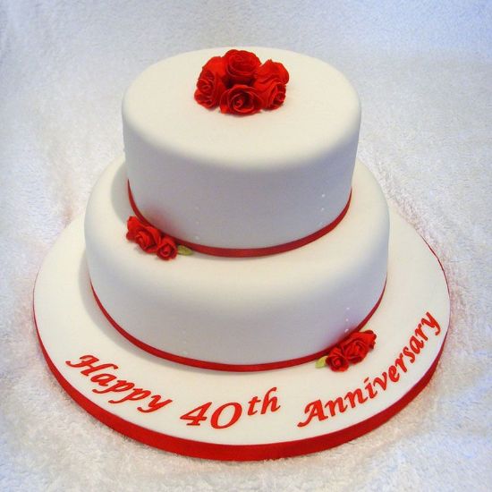 Picture of Gorgeous white anniversary cake with roses