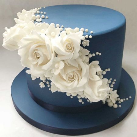 https://cookiesbakery.nop-station.com/images/thumbs/0000292_anniversary-cake-with-white-roses_450.jpeg
